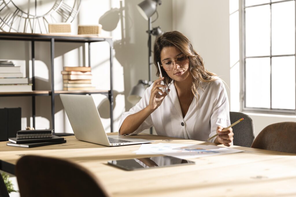 Healthcare recruiter on the phone with a candidate discussing their resume