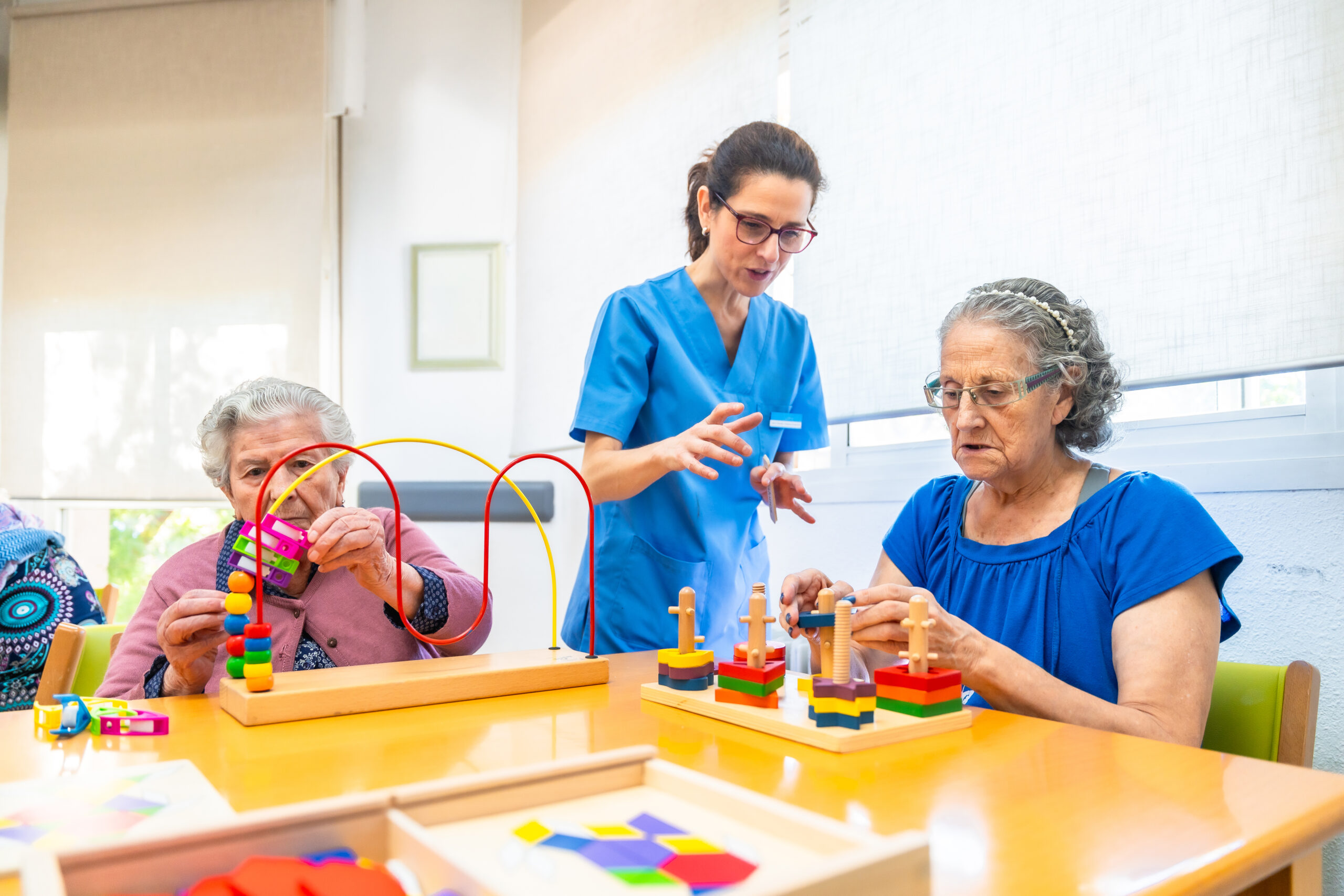 Occupational Therapist Assistant working with a patient on motor skills